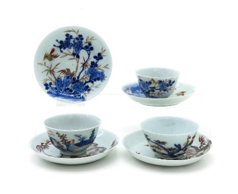 3 cups and 4 saucers, largest saucer 12 cm. in diameter, chip and hairline.