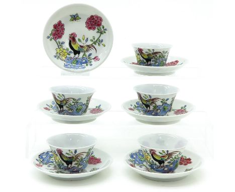 5 plates and 6 saucers, depicting rooster in Famille Rose enamels, saucers are 10 cm. in diameter, chip and hairline.