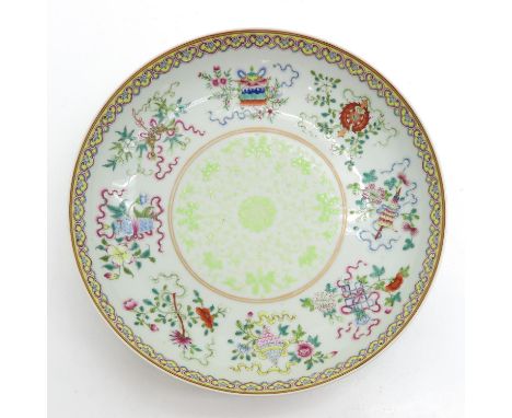 Famille Rose enamels with light green decor depicting flowers, 28 cm. in diameter, crackle in glaze.