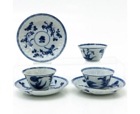 Depicting flowers, saucers are 11 cm. in diameter, fritting.