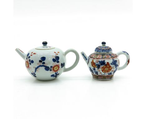 Depicting flowers, tallest teapot is 11 cm., with restoration.