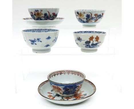 Including 5 cups and 2 saucers, saucers are 13 cm. in diameter, hairline.
