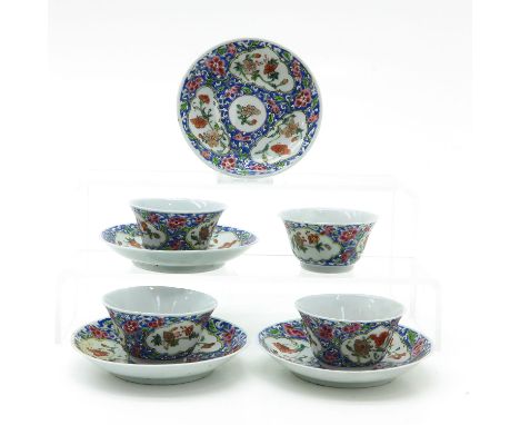 Depicting flowers, saucers are 11 cm. in diameter, fritting.