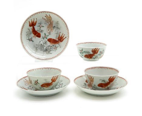 Depicting Karp in orange decor, saucers are 11 cm. in diameter, chip and hairline. 