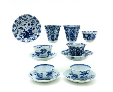Including 7 cups and 5 saucers, largest saucer is 13 cm. in diameter, chip and hairline.