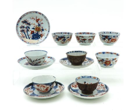 Lot of 8 cups and 5 saucers saucers are 12 cm. in diameter, chip and hairline.