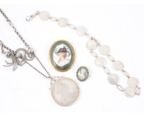 Two portrait miniature style brooches, a silver four pence coin bracelet, Maria Theresa coin pendant on a silver coloured wat