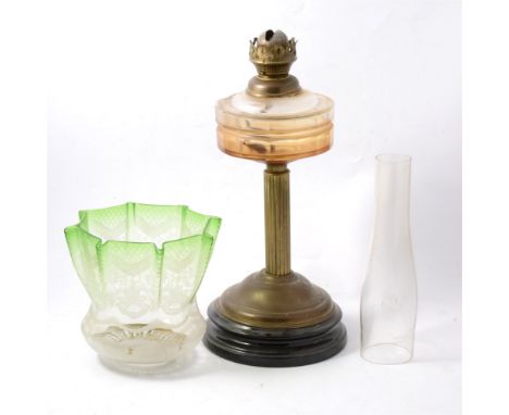 Edwardian brass column oil lamp, fluted column, raised on black porcelain socle, etched glass shade.