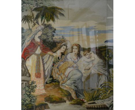 A large framed needlework tapestry, depicting the discovery of the baby Moses, 96cm x 80cm.