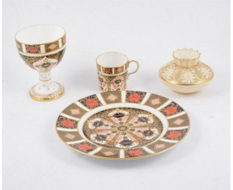 Four pieces of Royal Crown Derby Imari ware, including 8" plate, pedestal cup, and a coffee can; together with a Worcester iv