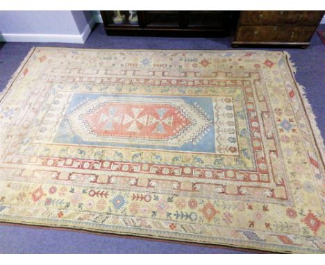 Turkish Caucasian pattern carpet, multi-bordered, 368cm x 252cm.