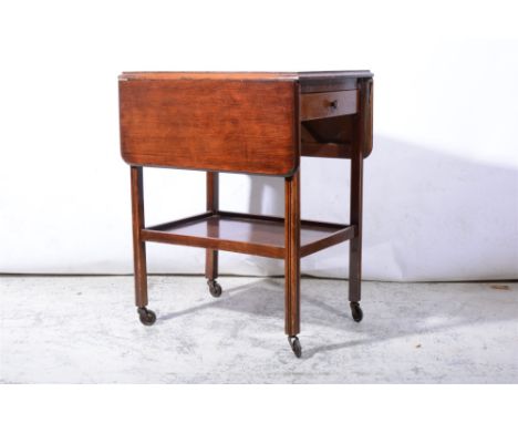 A vintage travelling trunk, stiffened canvas shell; and an oak dinner wagon, drop leaf flaps, single frieze drawer (2).