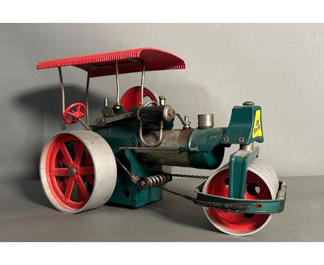 A Wilesco Old Smokey steam roller with burner 