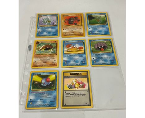 A selection of Pokemon cards 8 Jungle set and 9 Fossil cards.