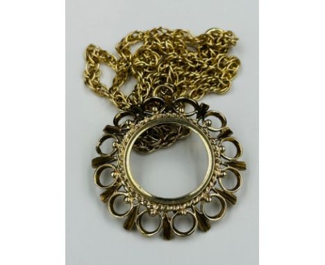 A 9ct gold chain and coin mount, approximate weight of 16.7g