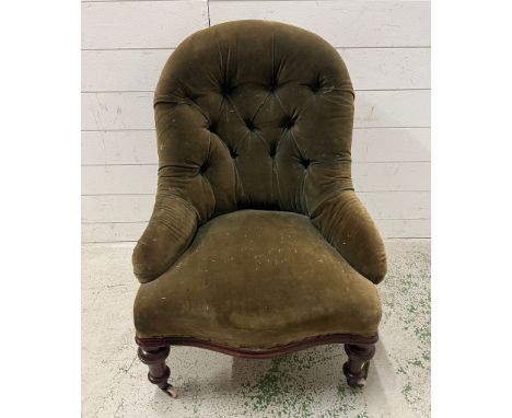 A button back nursing chair 