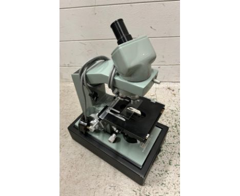 A Watson microscope 
