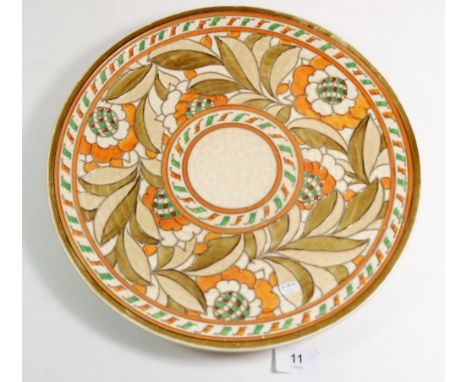 A Crown Ducal Charlotte Rhead charger with orange floral decoration, 33cm diameter 