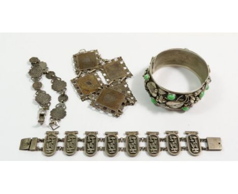 An Italian bangle set green stones and cast leaves plus three Eastern white metal bracelets (one a/f) 