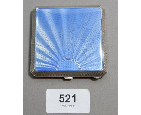 A silver and blue enamel compact with Art Deco sunray decoration, Birmingham 1938, Maker W W Perry &amp; Co. 88g