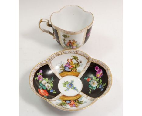 A Dresden porcelain cabinet cup and saucer painted panels of flowers and courting scenes, A R mark 