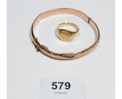 An Edwardian 9 carat gold hinged bracelet with engraved decoration Birmingham 1906 (bracelet misshapen) together with a mid 2