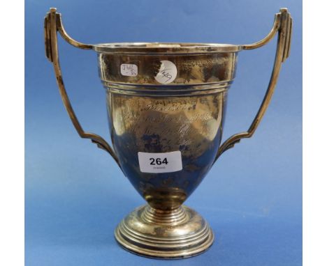 A silver two handled trophy cup with engraved presentation for 'The Best Tractor Ploughman Chuchstoke Parish', 551g, Birmingh