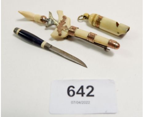 A Japanese Meiji period ivory miniature kris dagger brooch with yellow metal mounts and a miniature whistle charm and miniatu