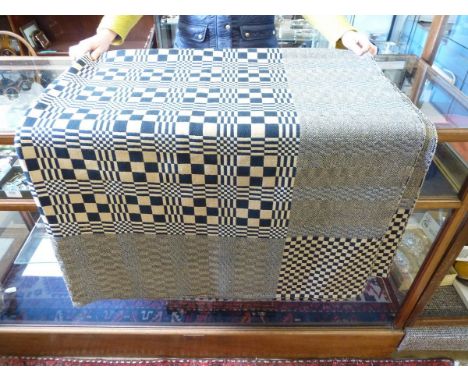A Welsh blanket or 'Carthen' made from two joined panels and a vintage blanket