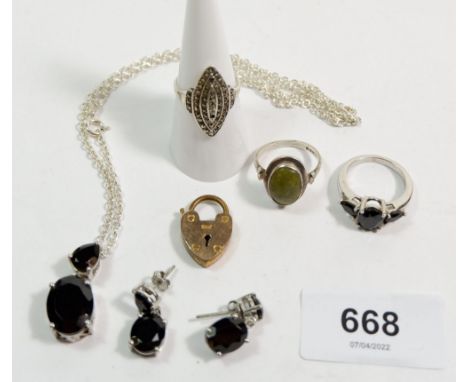 A silver necklace, earrings and ring set black stones, two silver rings etc. 