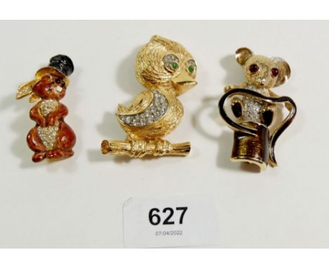An Attwood and Sayer enamel and paste mouse brooch, a Carven diamante bird brooch and a cartoon rabbit brooch 