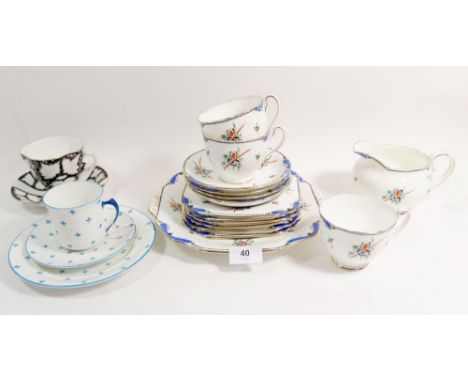A Sampson Smith part tea service comprising: three cups and four saucers, six tea plates, cake plate and jug plus one other t