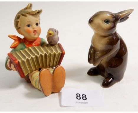 A Hummel accordion player and a Hummel rabbit 