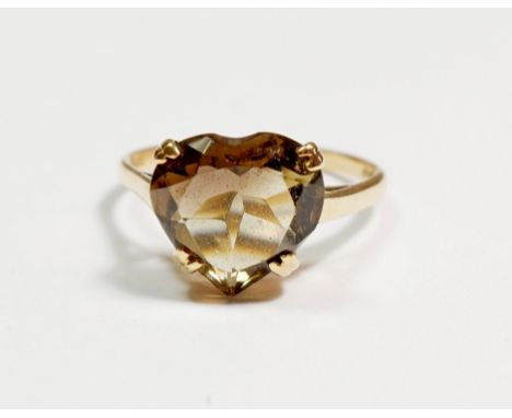 A 1970's 9 carat gold ring set with heart shaped smokey quartz, size R to S 