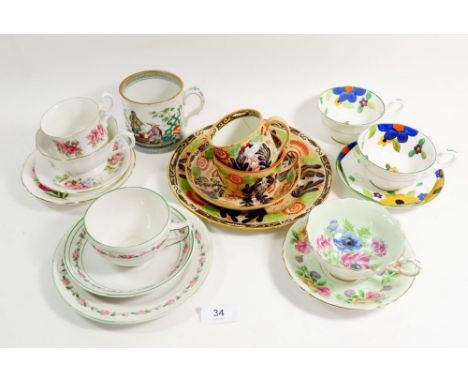 A collection of various cups and saucers including Pekin mug 