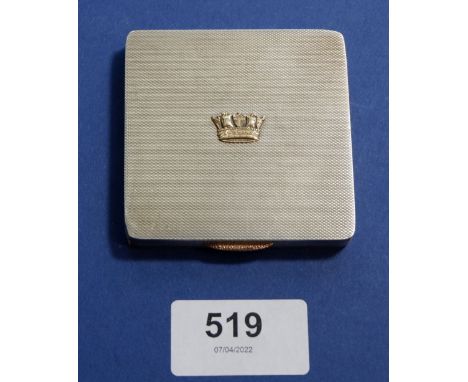 A silver compact with yellow metal crown motif, Birmingham 1943, Maker W H Manton