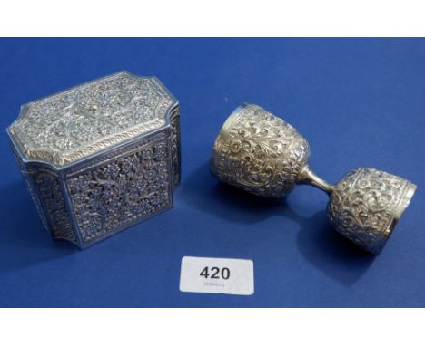 A white metal tea caddy with all over floral branches 8.5 cm wide and a white metal wager cup 10cm , 258g