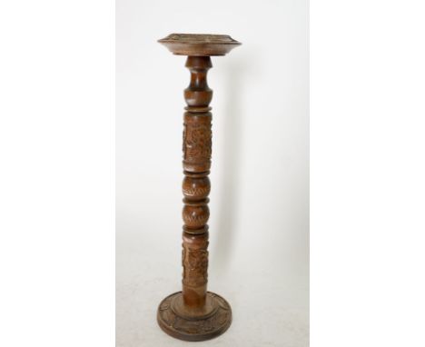 A vintage carved wood ashtray stand