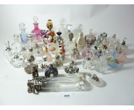 A box of various vintage perfume bottles 