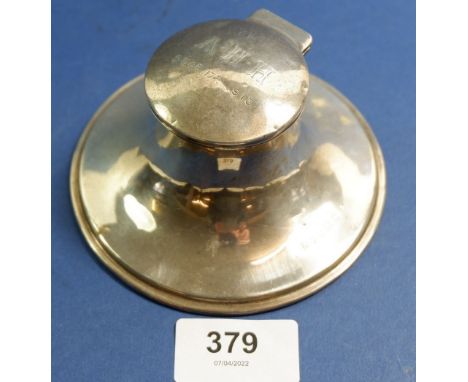 A silver capstan inkwell engraved to lid, 11cm, Birmingham 1911 