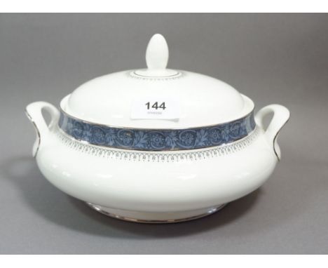 A Royal Doulton Sherbrook dinner service comprising: two tureens, six dinner plates, six tea plates, six side plates, two jug