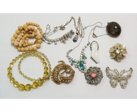 A box of vintage costume jewellery including paste necklaces etc. 