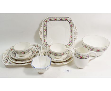 A Shelley floral tea service with ten cups and saucers, ten tea plates, milk and sugar - pattern no 10755 and a Shelley Iris 