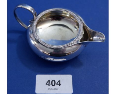 A small silver cream jug, 56g, Birmingham 1894 by Haseler Bros 