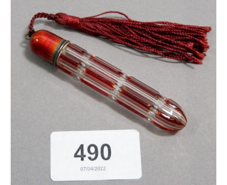 A Victorian red overlaid glass scent phial with red enamel lid and tassel, 7.8cm 