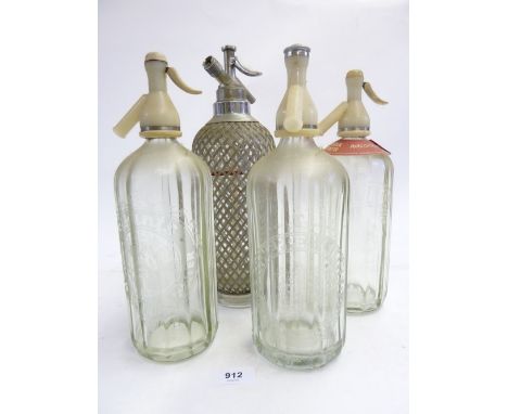 Four various antique and vintage soda siphons 