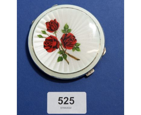 A silver and enamel compact decorated roses Birmingham 1957, by T &amp; S