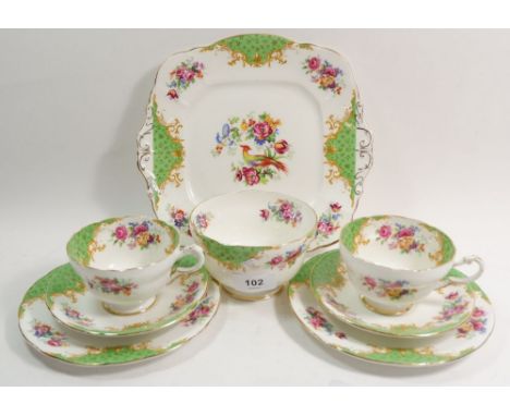 A Paragon Rockingham tea service comprising: five cups and saucers, six tea plates, cake plate and sugar 