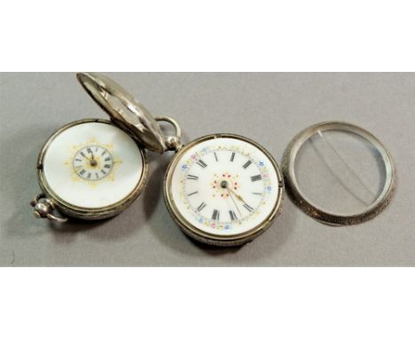 A Swiss 935 silver fob watch with star form dial and another silver fob watch with enamel dial 