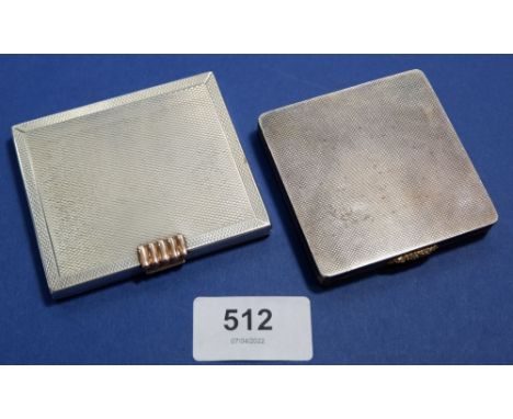 An Asprey silver engine turned compact with yellow metal clasp, Birmingham 1960 and a similar Swiss compact marked Sterling S